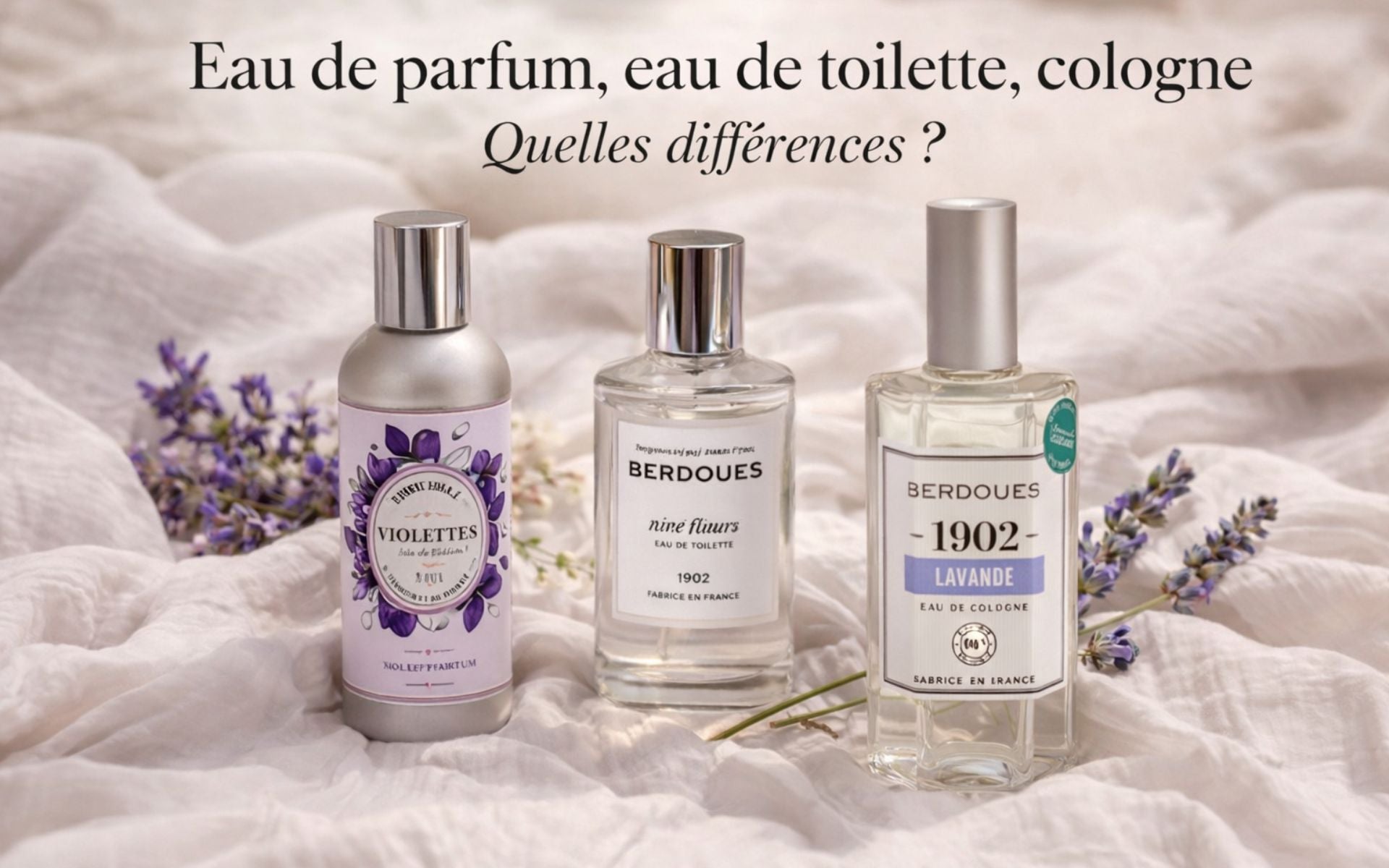 Trois flacons Berdoues illustrant eau de parfum, eau de toilette et eau de cologne, disposés sur un textile clair avec des fleurs, pour comparer les différentes concentrations de parfum